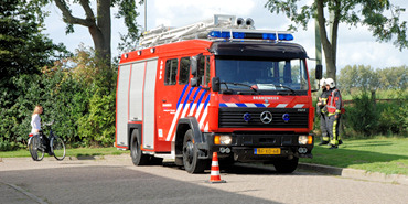 Brandje langs spoor bij Arnemuiden