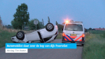 Automobilist slaat over de kop van dijk Poortvliet
